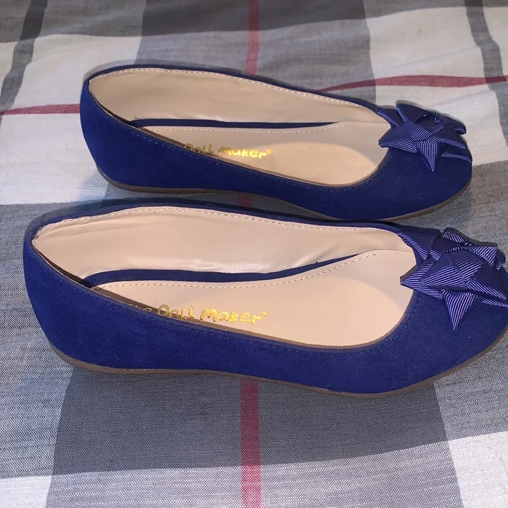 Kids shoes. The doll maker brand.